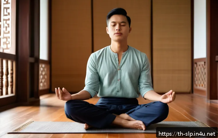 음성치료의 다양한 방법 - A focused young Thai man practicing deep breathing exercises in a peaceful indoor setting, sitting c...